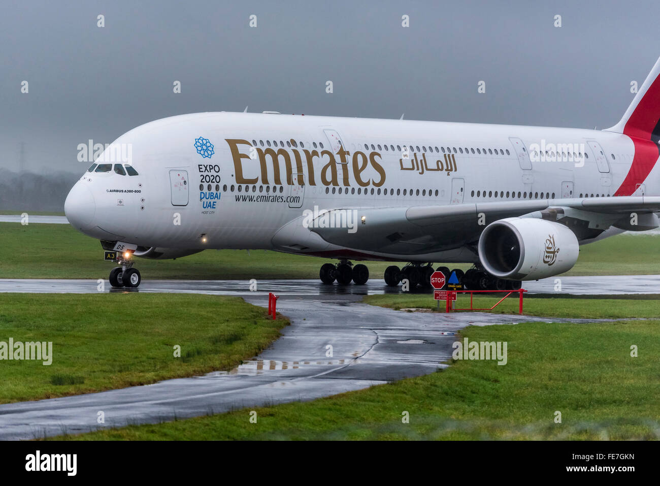 Emirates Airbus A380-800 in the wet at Manchester airport Stock