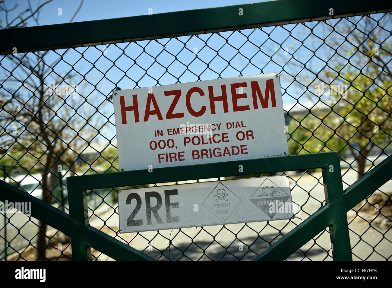 Hazchem sign warning of hazardous, dangerous chemicals, with Emergency Services, police and fire brigade, phone numbers. Stock Photo