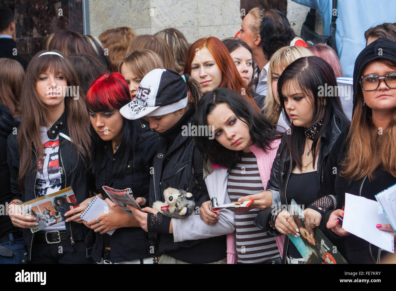 Teenage pop fans gather outside the Ritz-Carlton Hotel, Moscow, Russia Stock Photo