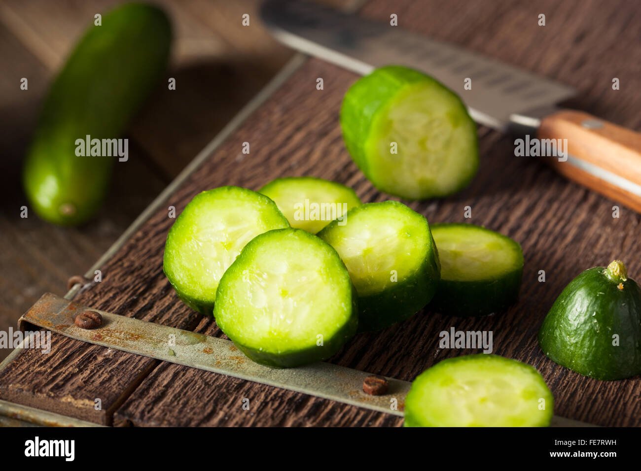 Fresh Raw Mini Cucumber Isolated On White Stock Photo - Download