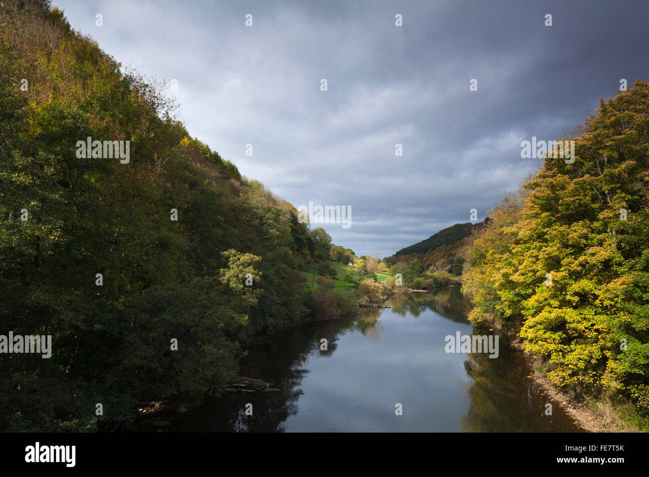 Stormy sky above the River Wye in autumn on the old railway crossing at Redbrook near Monmouth in the lower Wye Valley, Monmouthshire, Wales. Stock Photo