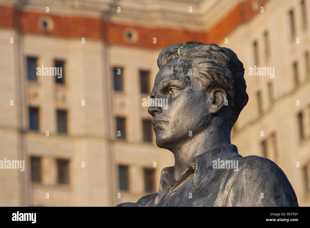 Socialist realist statue of student at Moscow State University, one of Stalin's Seven Sisters Moscow, Russia Stock Photo