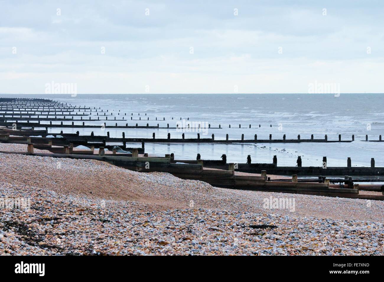 wooden groynes water breaker breaks at the beach Stock Photo - Alamy