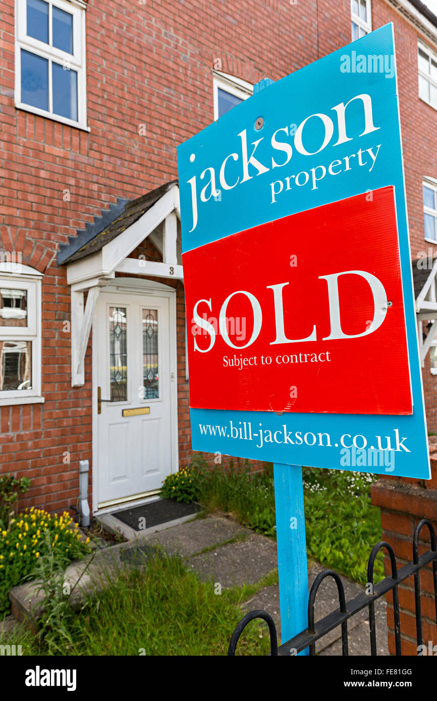 Sold sign on house, Hereford, UK Stock Photo