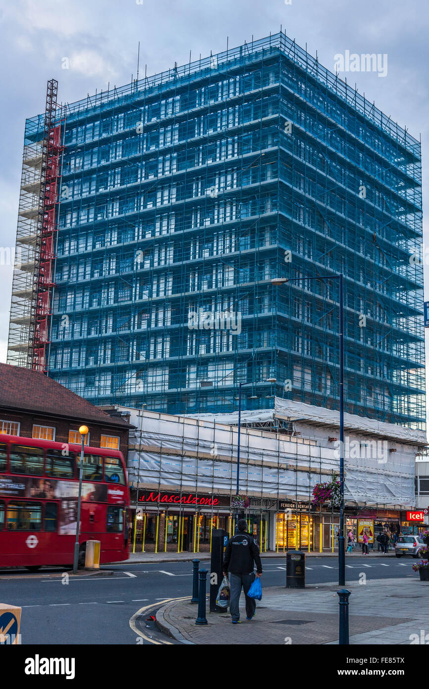 Scaffolding netting on mid-rise building, Edgware, Greater London, England, UK. Stock Photo