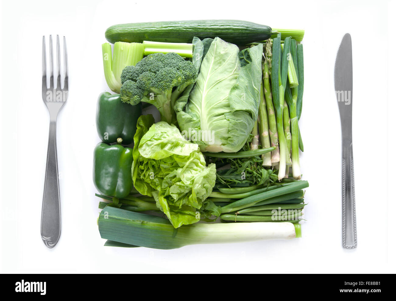 Miniature fresh green vegetables packed together as a meal Stock Photo