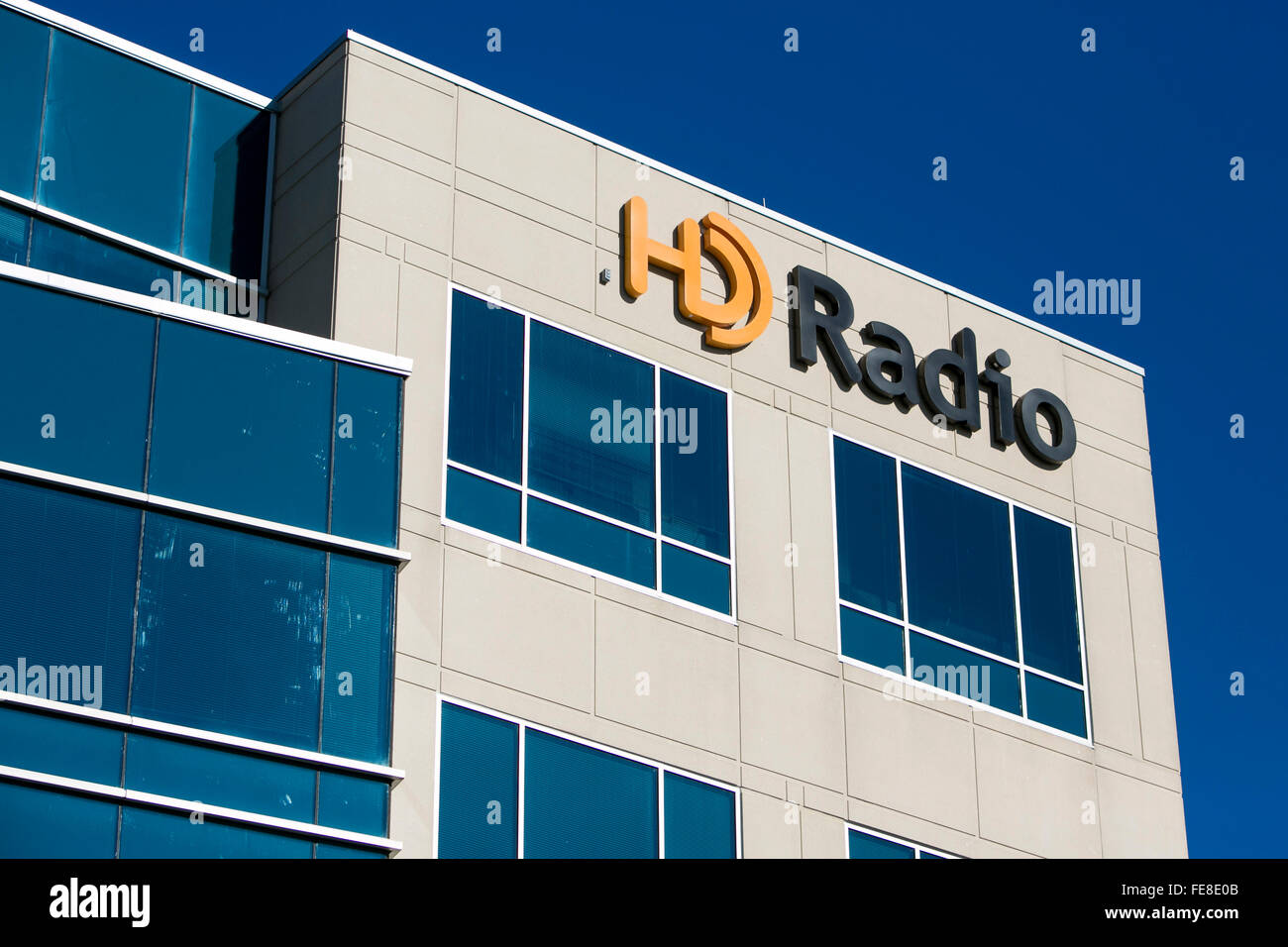 A logo sign outside of the headquarters of HD Radio in Columbia, Maryland on January 2, 2016. Stock Photo