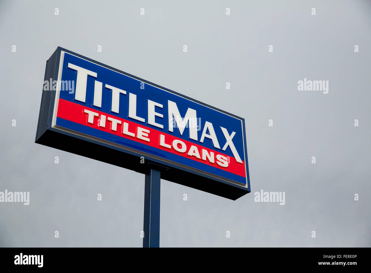 A logo sign outside of a TitleMax car title loan office in Tysons, Virginia on January 1, 2016. Stock Photo