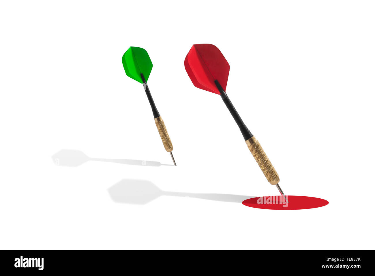 Two Darts and a Red Target on a White Background Stock Photo