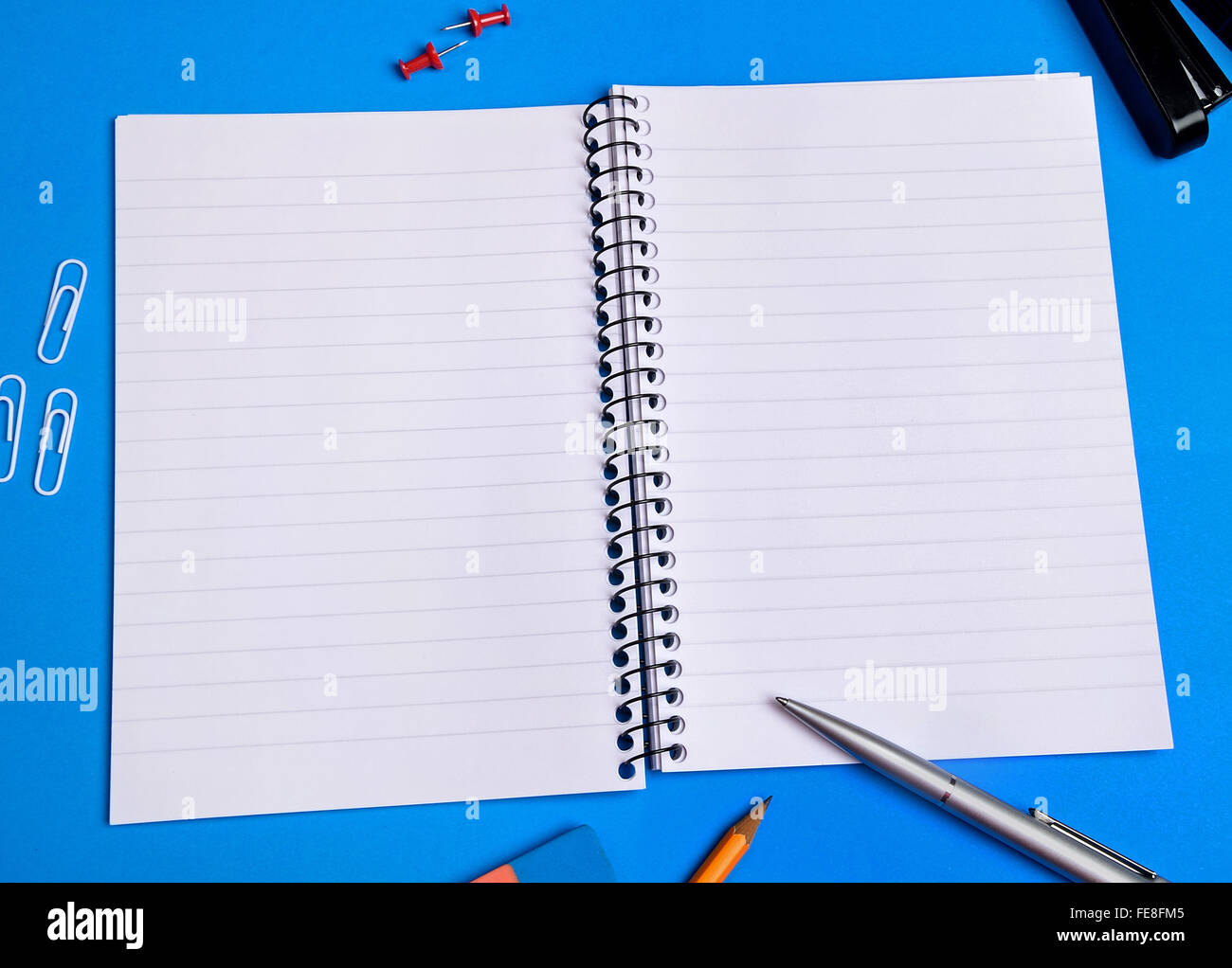 Empty notebook and office supplies Stock Photo Alamy