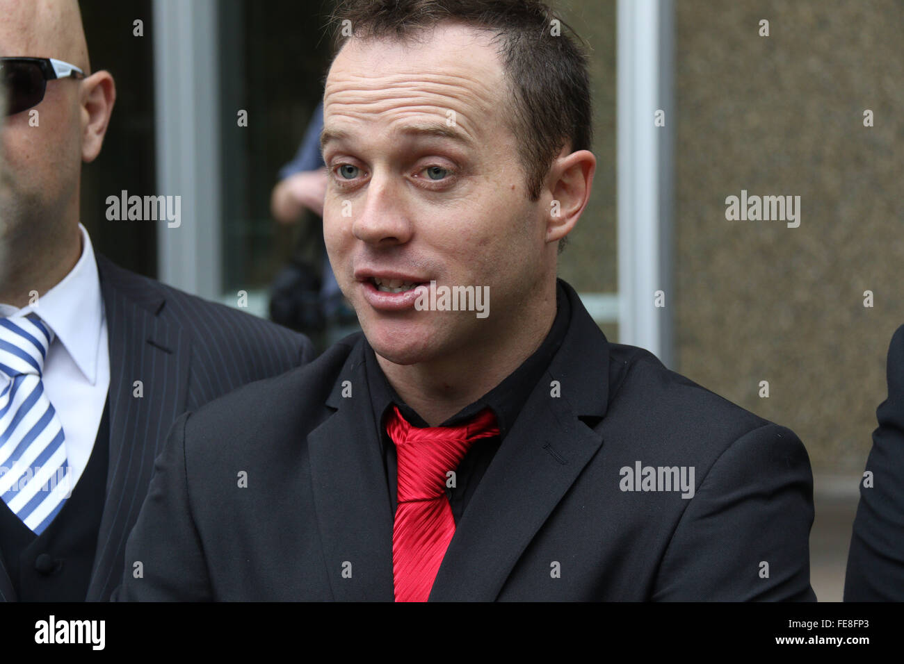 Sydney, Australia. 5 February 2016. Nick Folkes, Chairman of the Party for Freedom and Shermon Burgess, known as The Great Aussie Patriot left the Federal Court Australia after attending a directions hearing. They were jubilant that Sutherland Shire Council and Jamal Rifi had discontinued their legal action against them. Supporters including Ralph Cerminara attended the hearing. Left wing activist Shayne Hunter attended the hearing and afterwards went for a drink with the pariots. Pictured: Shermon Burgess, ‘The Great Aussie Patriot’ (red tie). Credit:  Richard Milnes/Alamy Live News Stock Photo