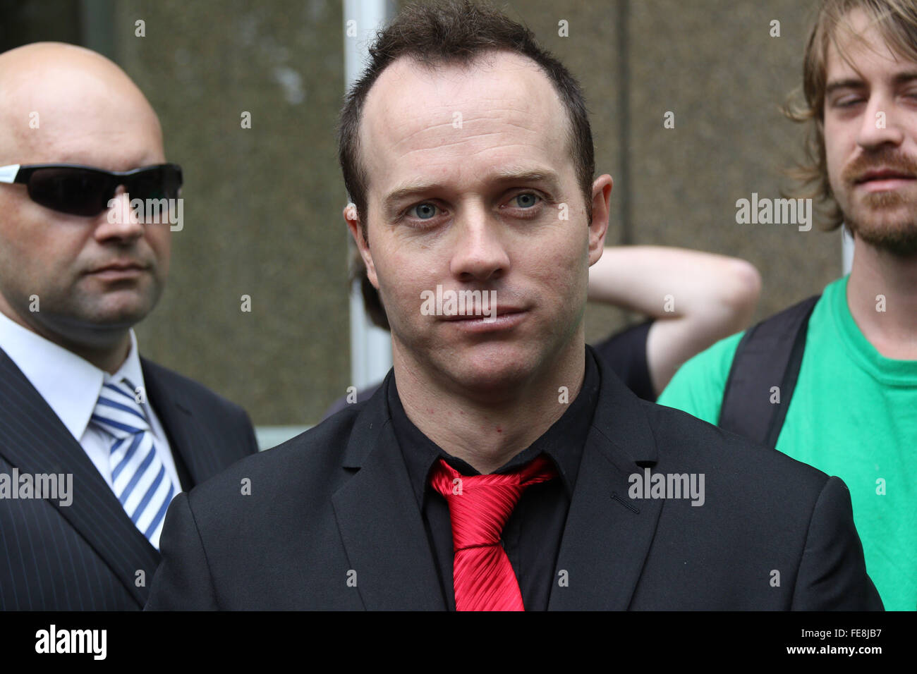 Sydney, Australia. 5 February 2016. Nick Folkes, Chairman of the Party for Freedom and Shermon Burgess, known as The Great Aussie Patriot left the Federal Court Australia after attending a directions hearing. They were jubilant that Sutherland Shire Council and Jamal Rifi had discontinued their legal action against them. Supporters including Ralph Cerminara attended the hearing. Left wing activist Shayne Hunter attended the hearing and afterwards went for a drink with the pariots. Pictured: Shermon Burgess (red tie). Credit:  Richard Milnes/Alamy Live News Stock Photo