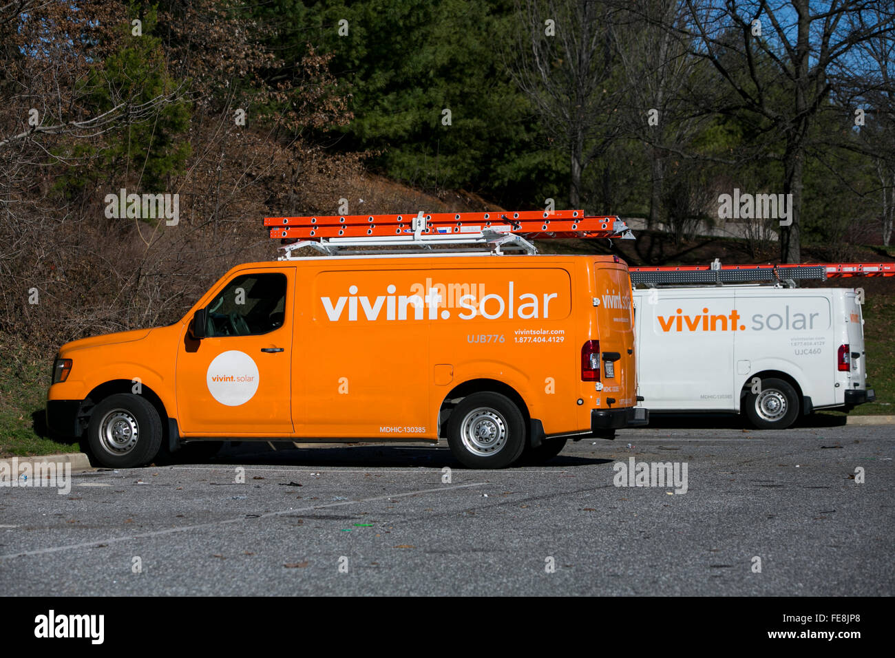 Work trucks with a Vivint Solar logo in Beltsville, Maryland on January 2, 2016. Stock Photo