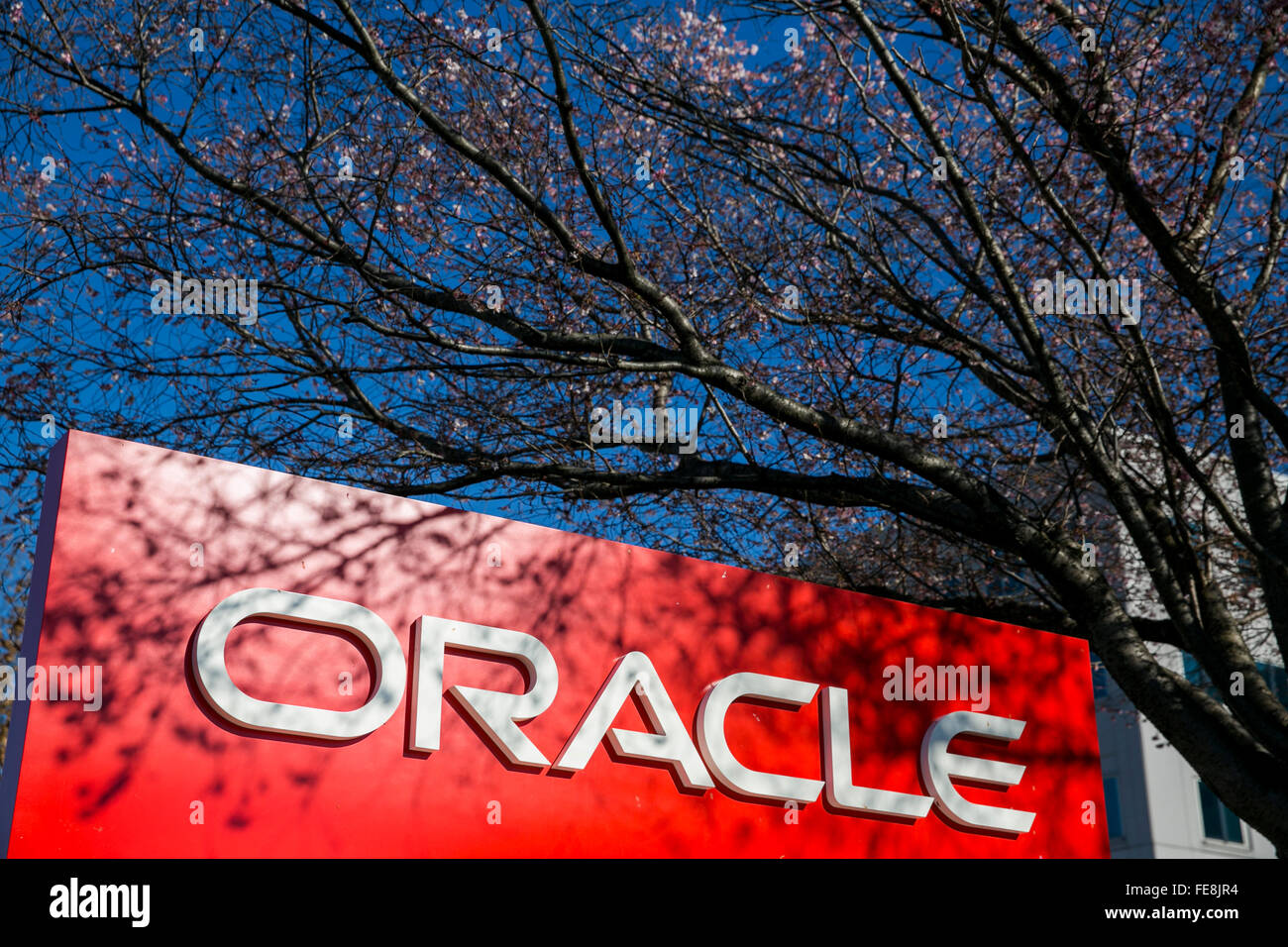A logo sign outside of an office building occupied by The Oracle Corporation in Columbia, Maryland on January 2, 2016. Stock Photo
