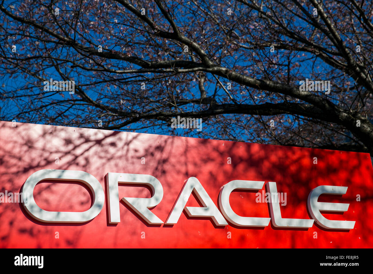 A logo sign outside of an office building occupied by The Oracle Corporation in Columbia, Maryland on January 2, 2016. Stock Photo