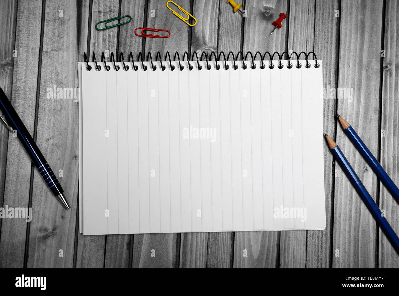 Assorted office supplies on wooden table Stock Photo Alamy