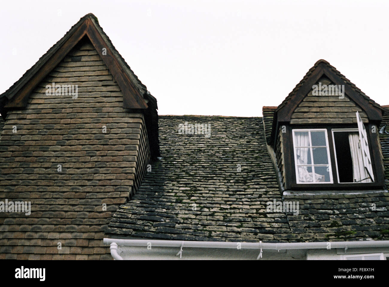 High Section Of House With Dormer Window Against Clear Sky Stock