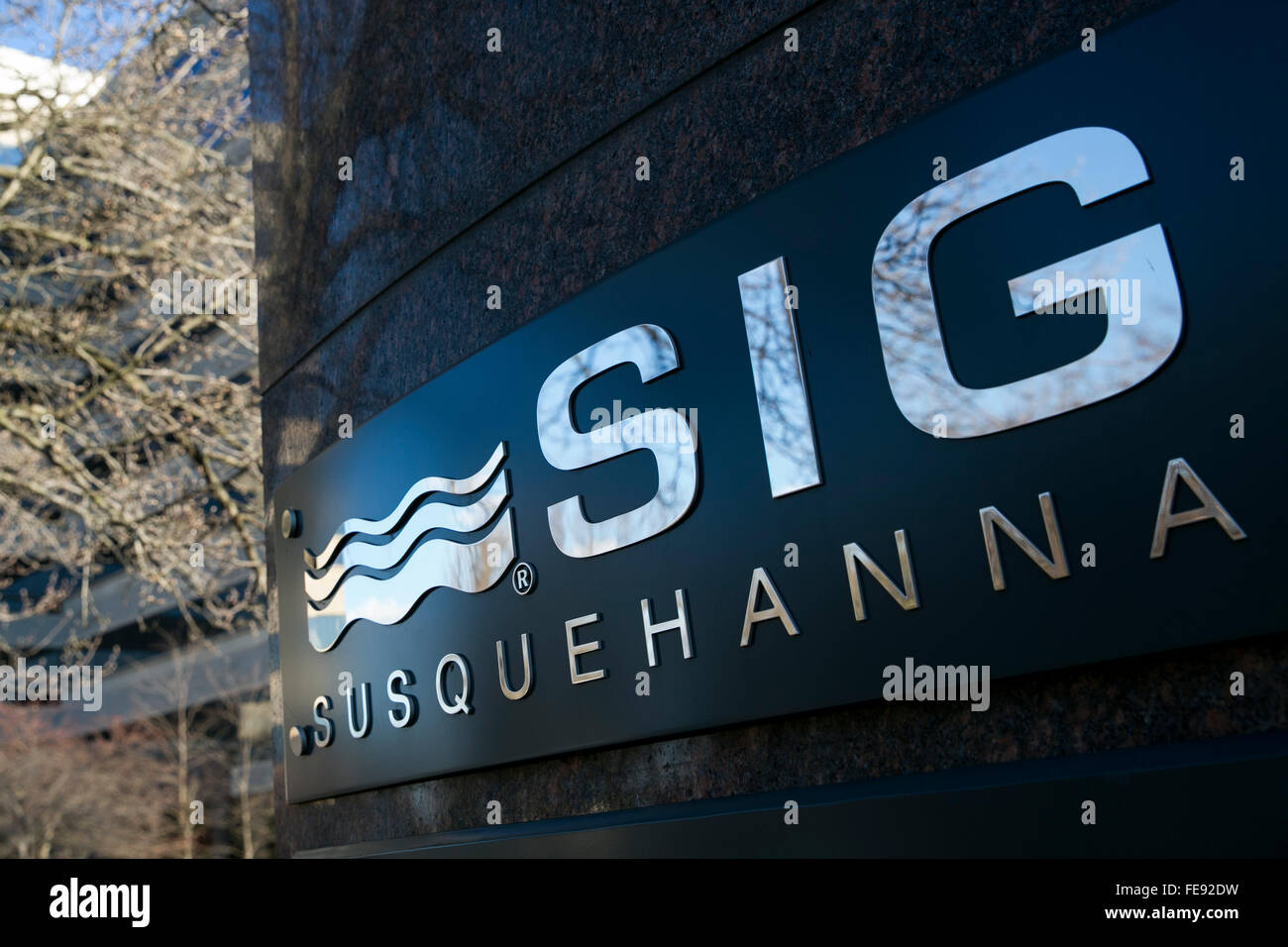 A logo sign outside of the headquarters of Susquehanna International