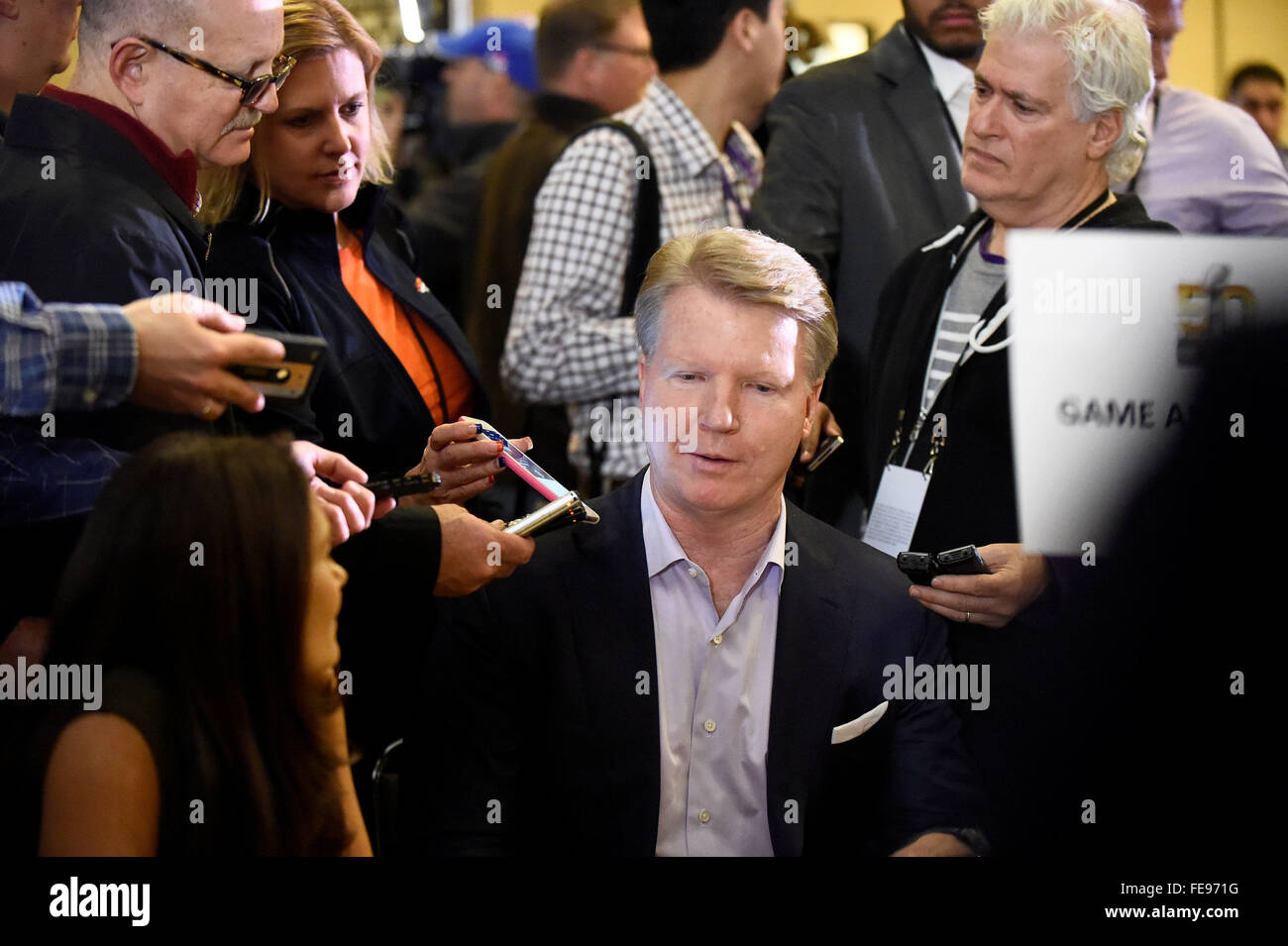 Monday, February 1, 2016: CBS sportscaster Phil Simms talks to members of the media during opening day of press conferences for the National Football League Super Bowl 50 between the Denver Broncos and the Carolina Panthers at the Moscone Center in San Francisco, California. Eric Canha/CSM Stock Photo