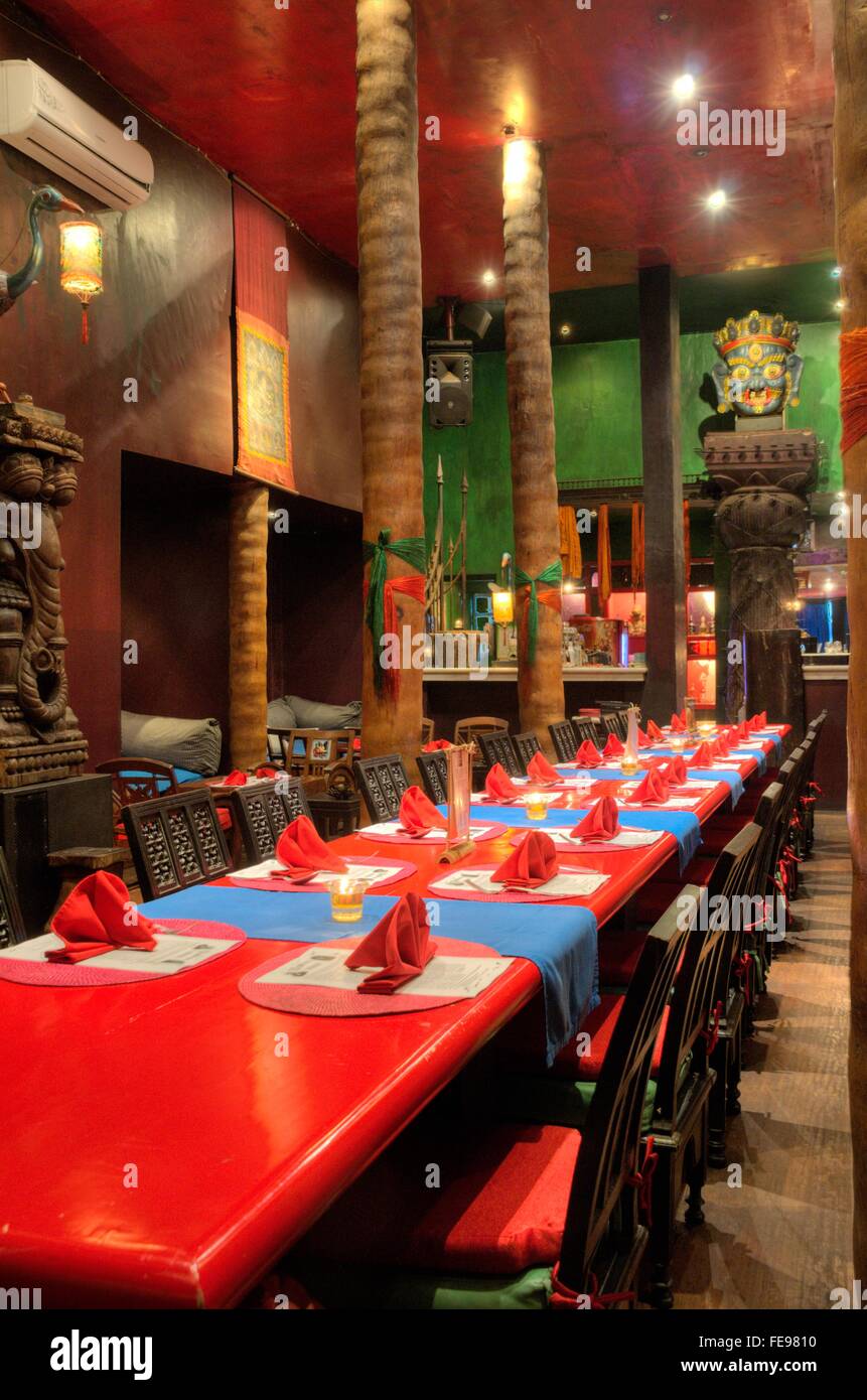 Exotic, rustic Asian themed dining room Stock Photo