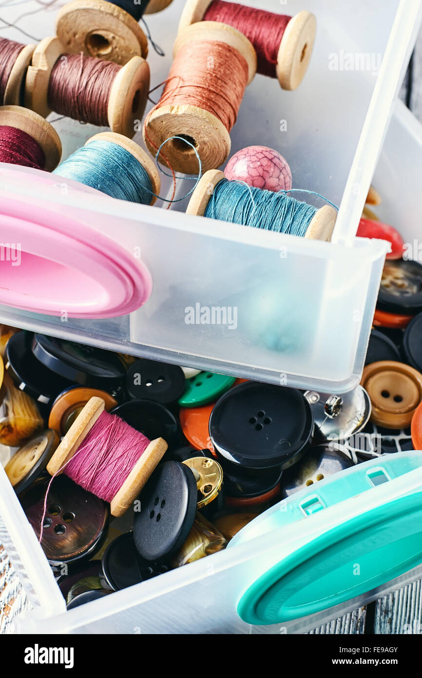 Two plastic sewing box with threads and buttons Stock Photo Alamy