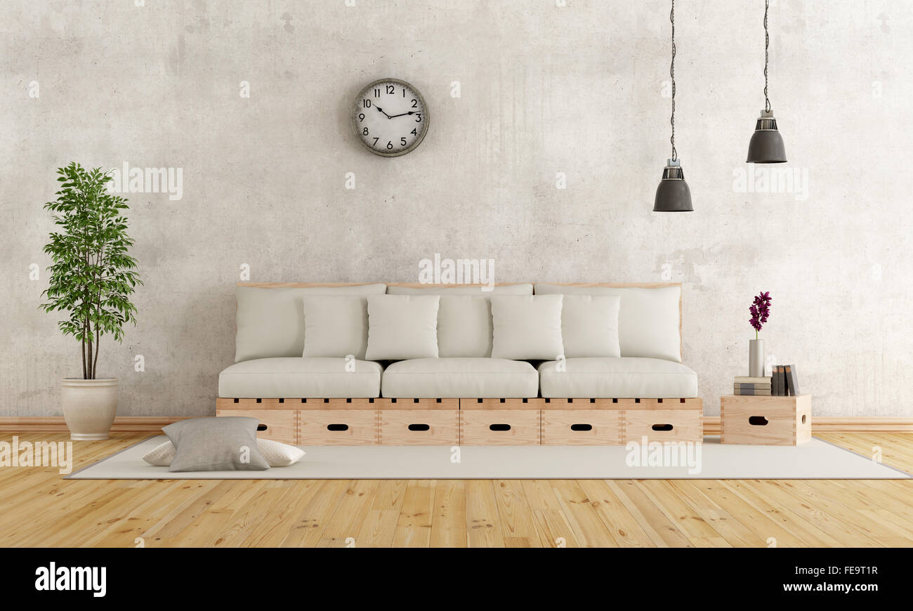 White living room with couch constructed with wooden boxes and pallets