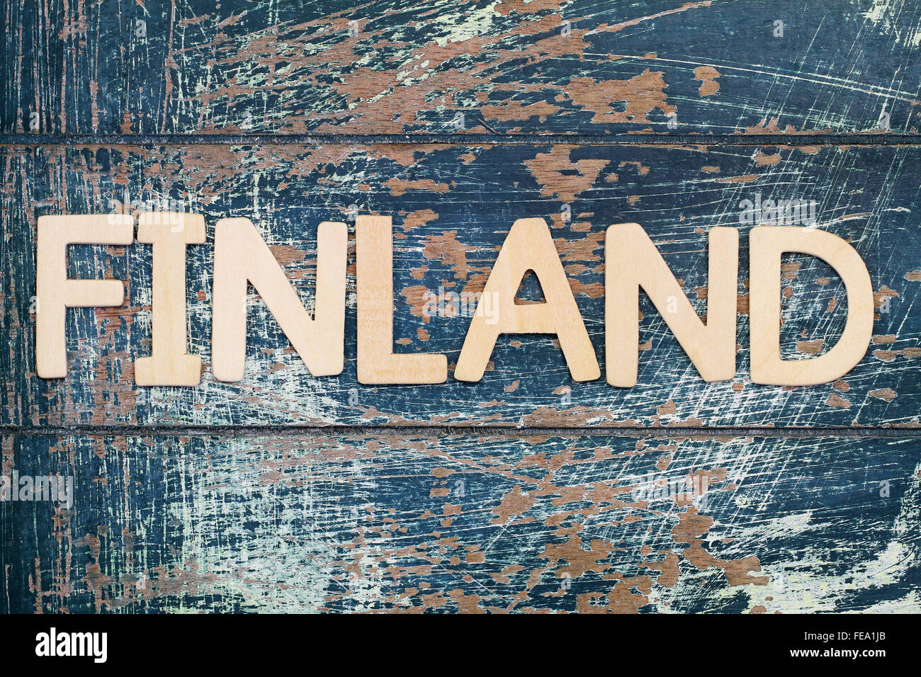 Finland written with wooden letters on rustic surface Stock Photo