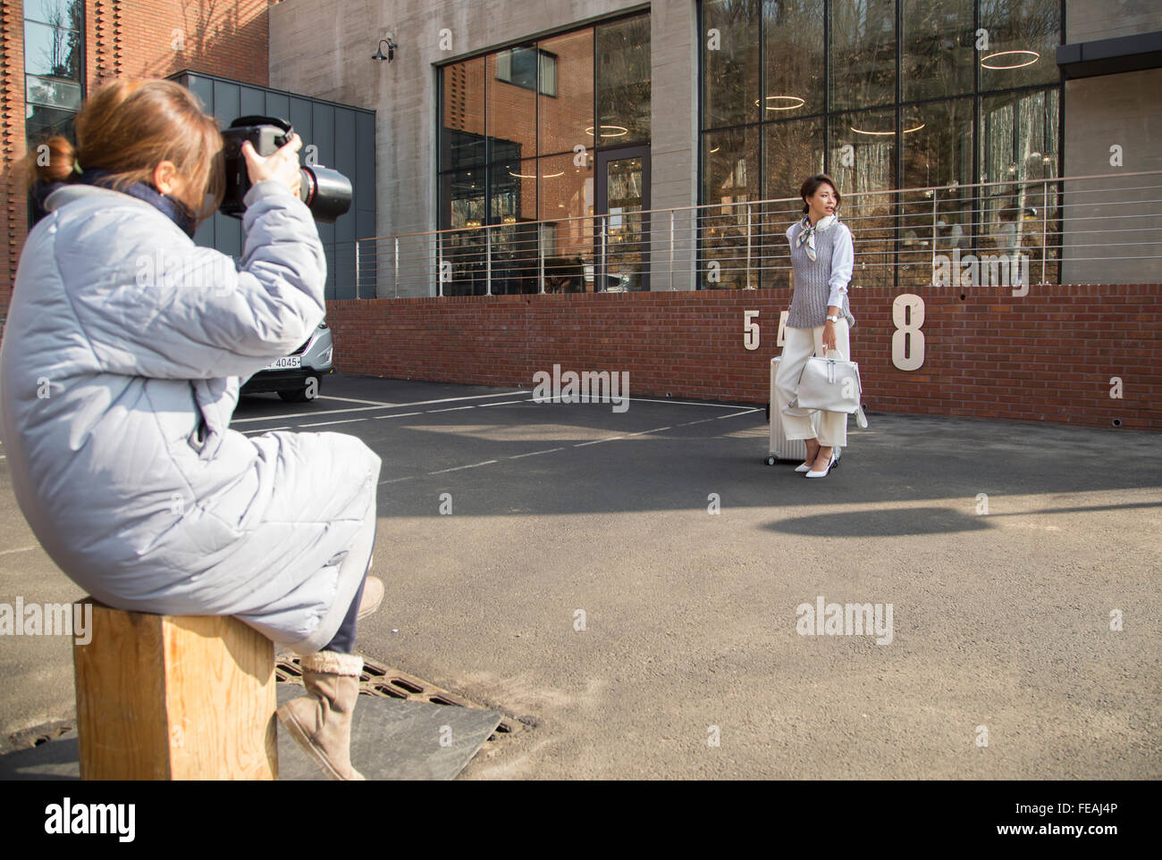 Shiho Yano, Feb 4, 2016 : Japanese model Shiho Yano (R) poses during a