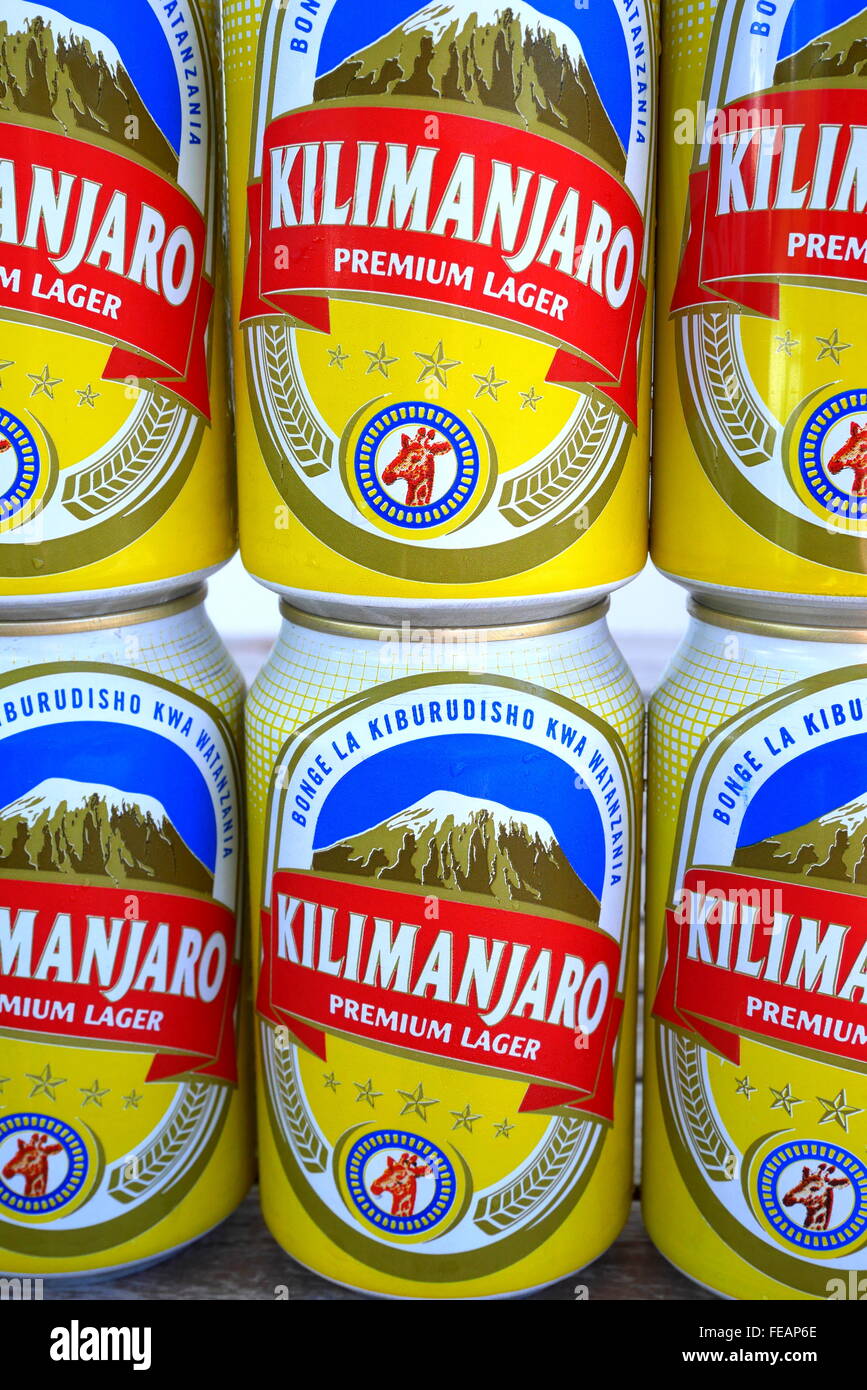Six cans of Tanzanian beer - Kilimanjaro. Stock Photo