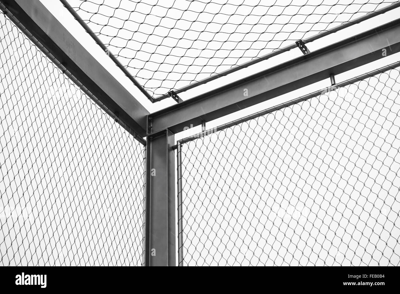 Corner of steel chain link fences, restricted area border Stock Photo