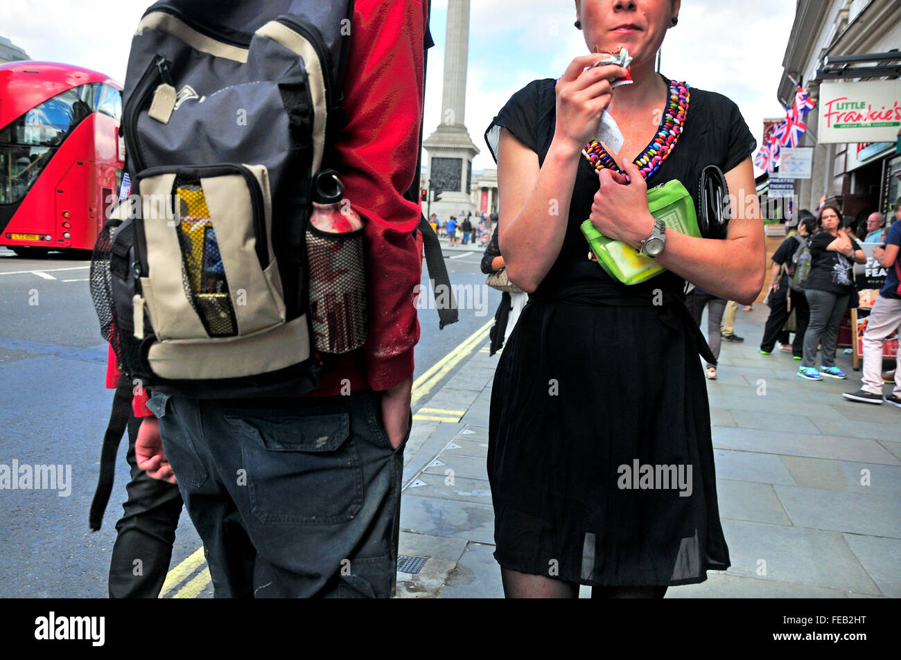 London, England, UK. Woman eating a snack in Whitehall Stock Photo