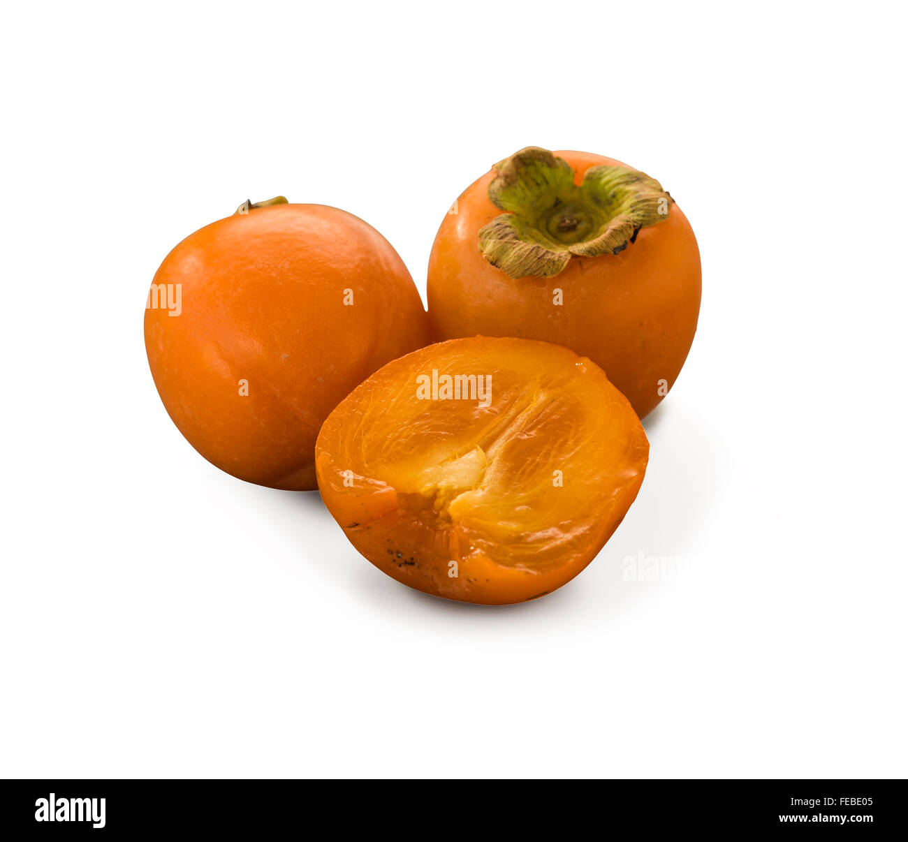 Organic Persimmons isolated on white Stock Photo Alamy