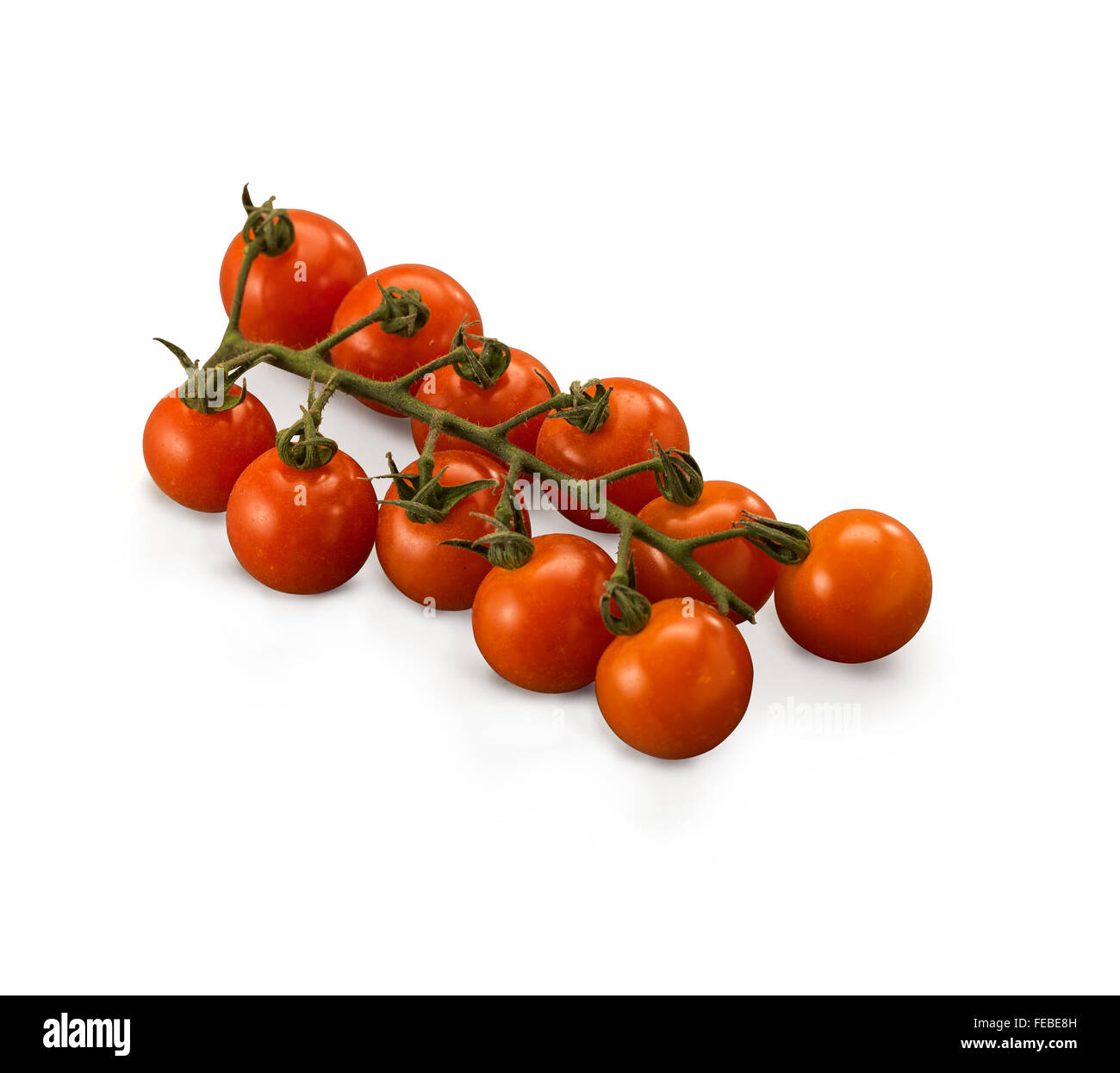 Organic Cherry vine tomatoes isolated on white background Stock Photo