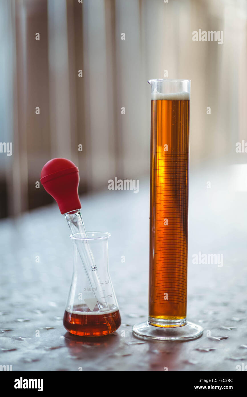 Sample of beer in beaker Stock Photo Alamy