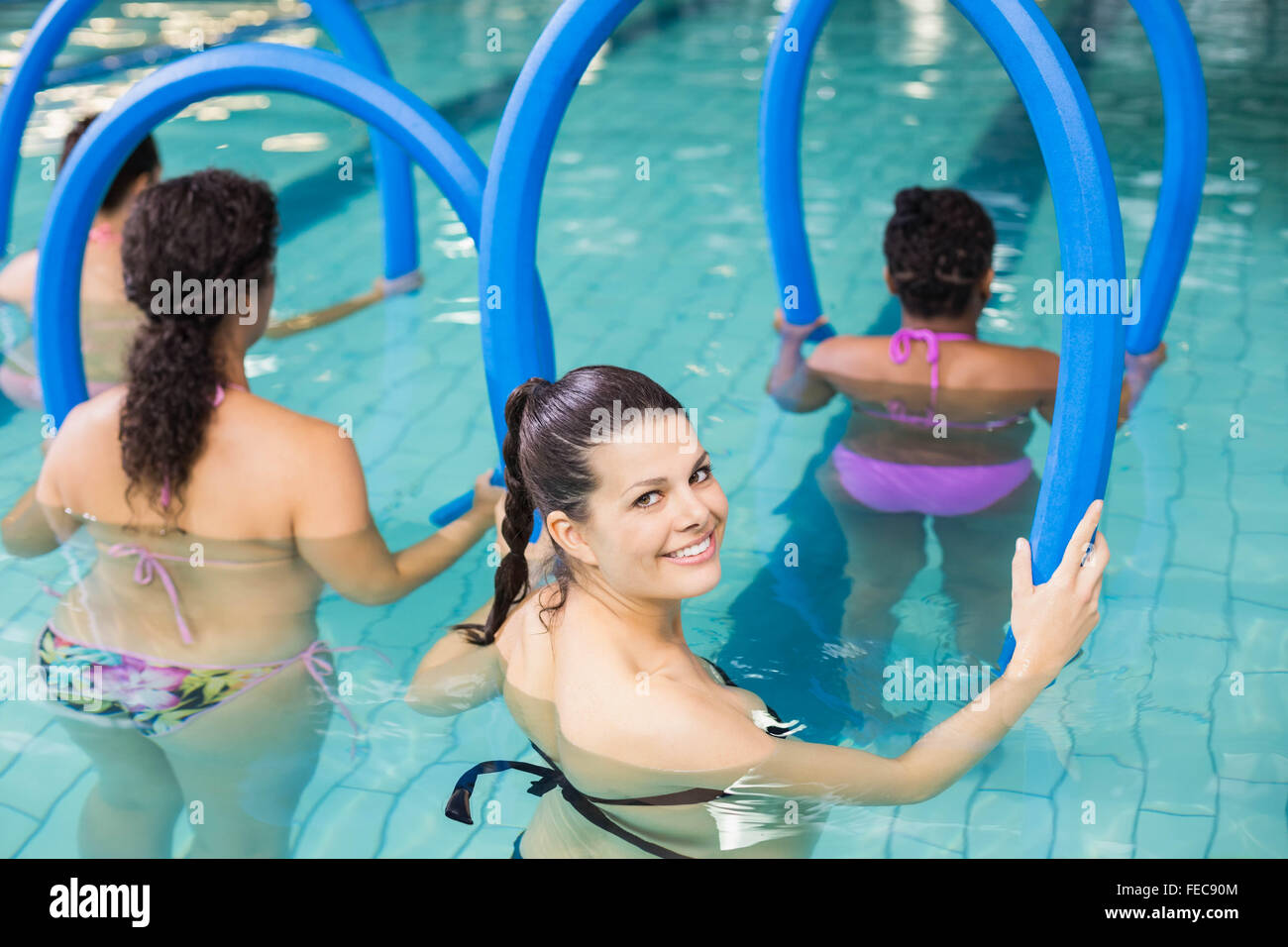 Pregnant woman exercising with foam rollers Stock Photo Alamy