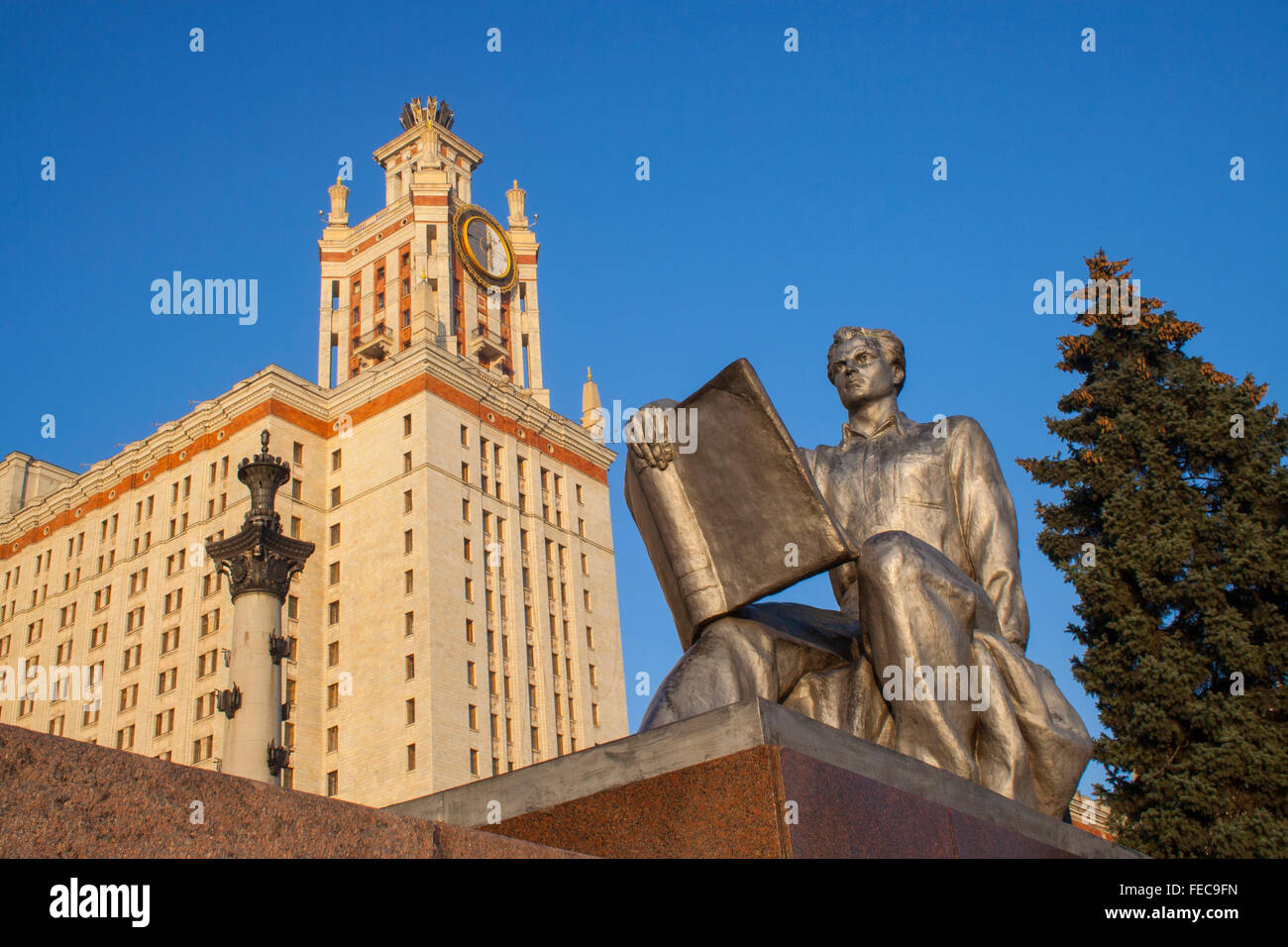 Socialist realist statue of student at Moscow State University, one of Stalin's Seven Sisters Moscow, Russia Stock Photo