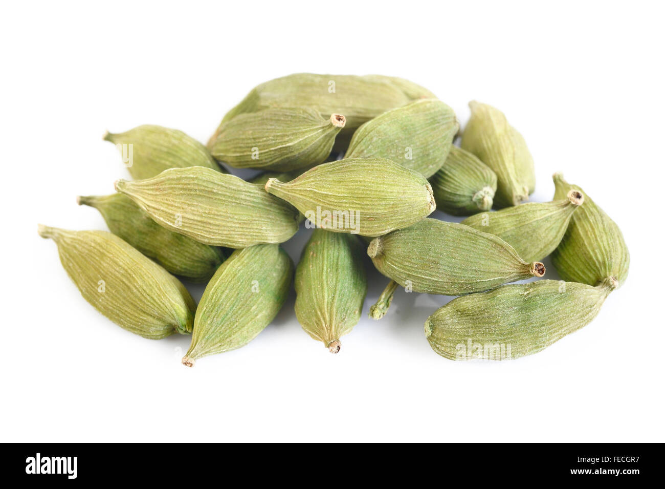 green cardamom pods on white background Stock Photo Alamy