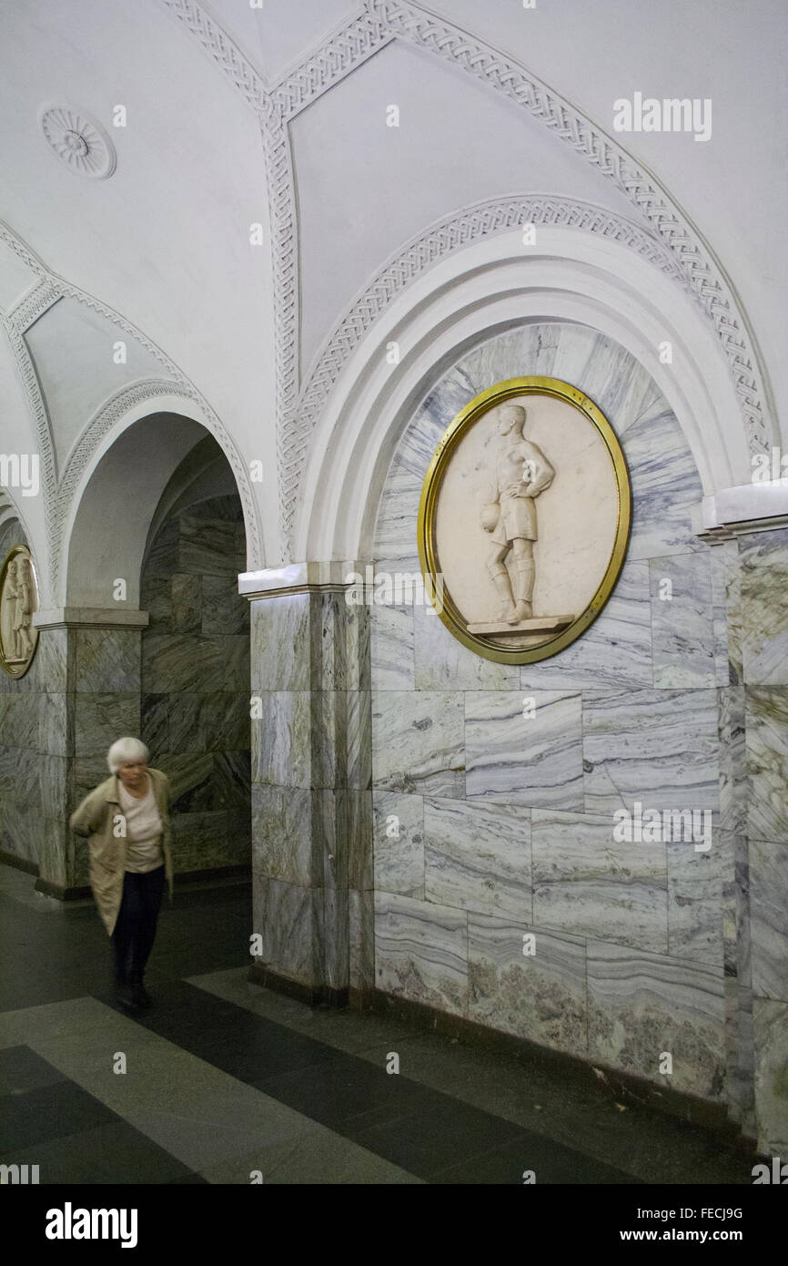 Bas-relief of a footballer on Park Kultury metro station platform, Moscow, Russia Stock Photo