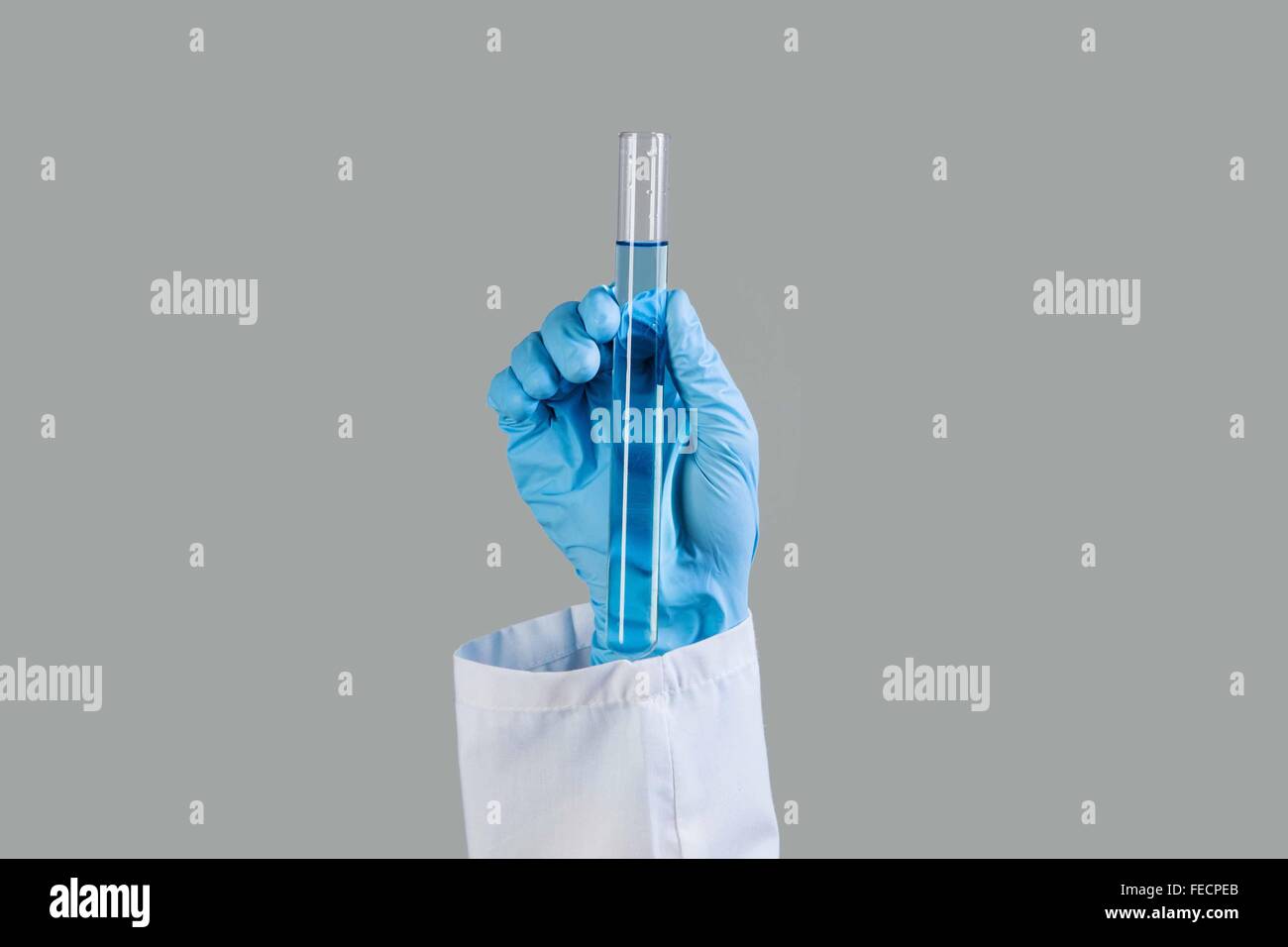 Close up image of scientist hands holding testing tube Stock Photo - Alamy
