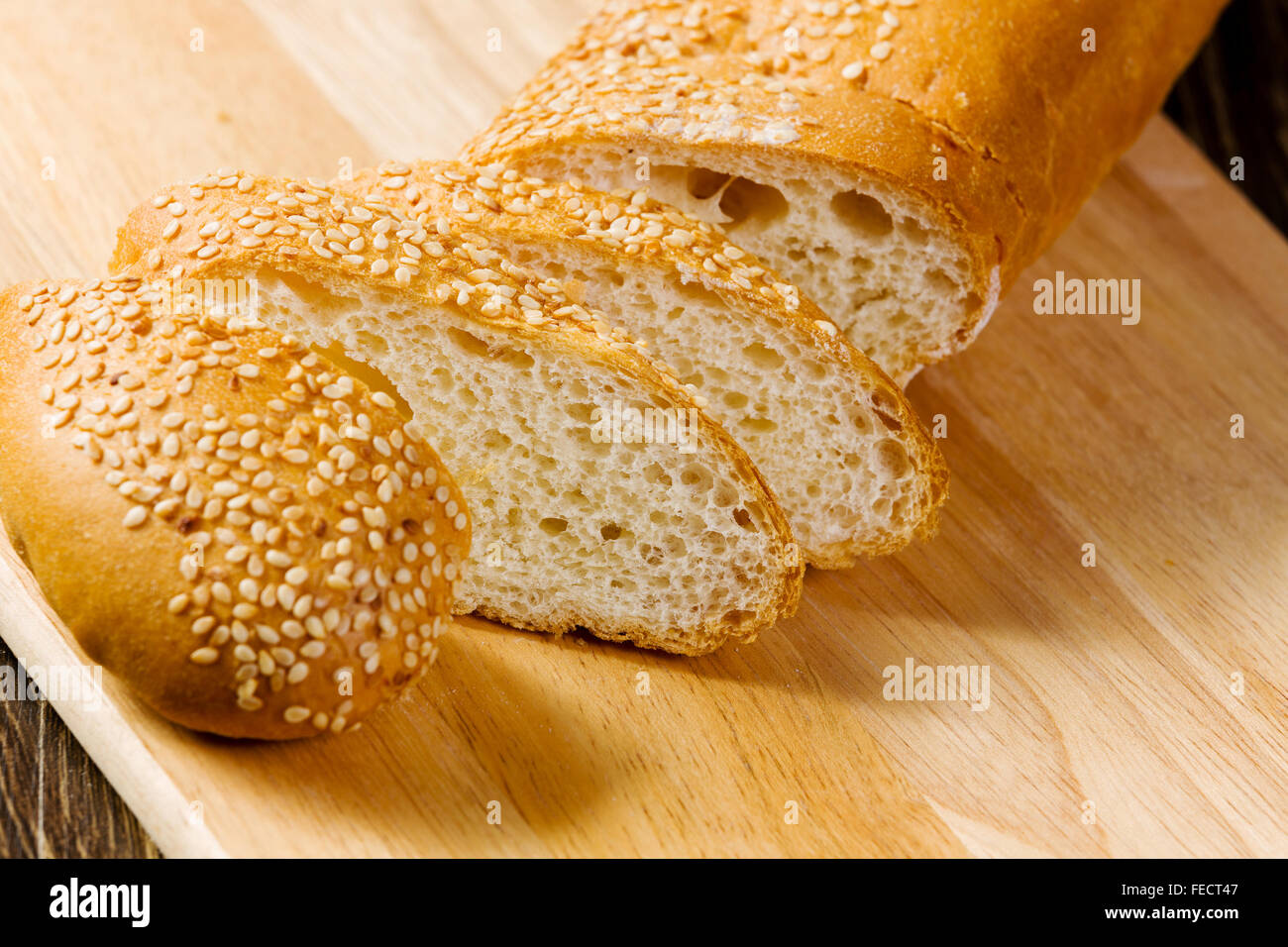 Fresh white sliced bread lying on table Stock Photo - Alamy