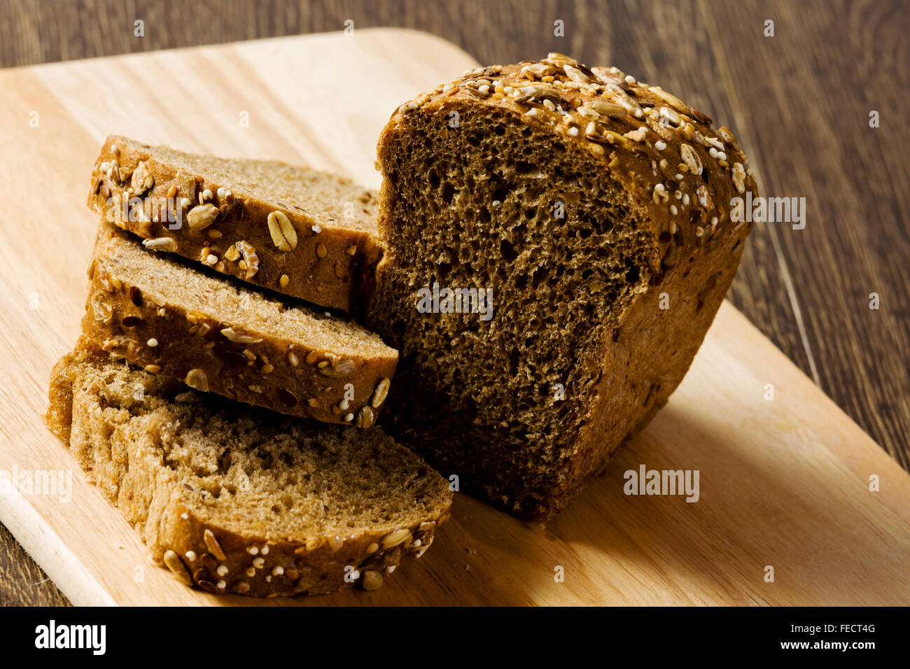 Fresh white sliced bread lying on table Stock Photo - Alamy