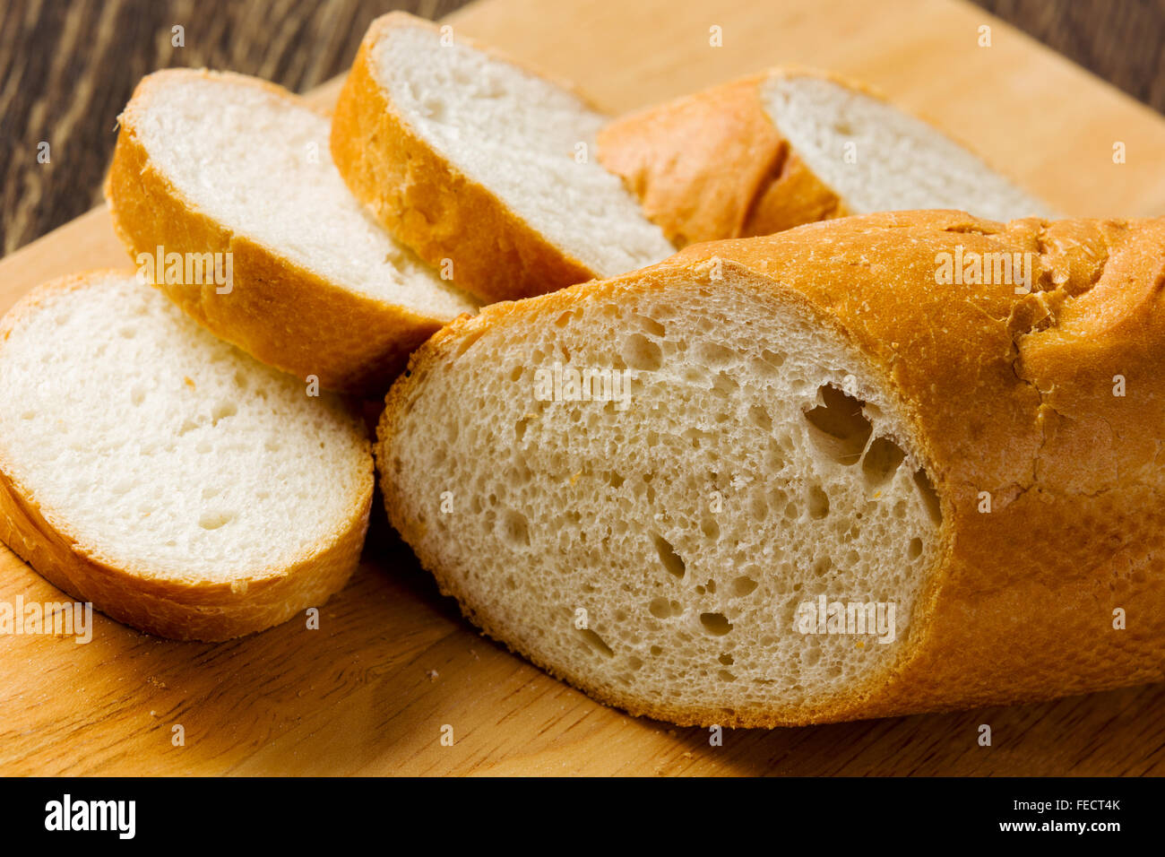 Fresh white sliced bread lying on table Stock Photo - Alamy