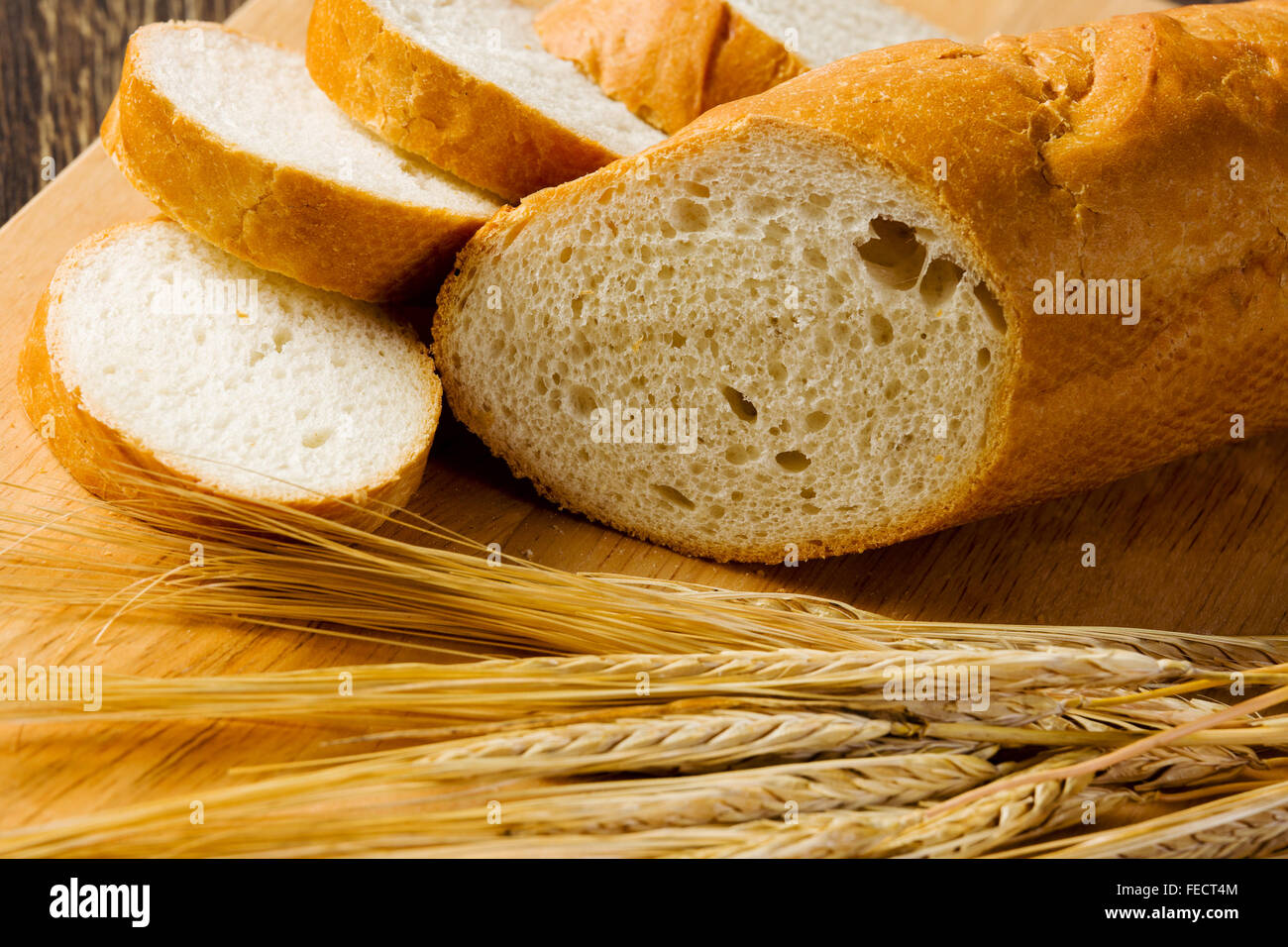 Fresh white sliced bread lying on table Stock Photo - Alamy