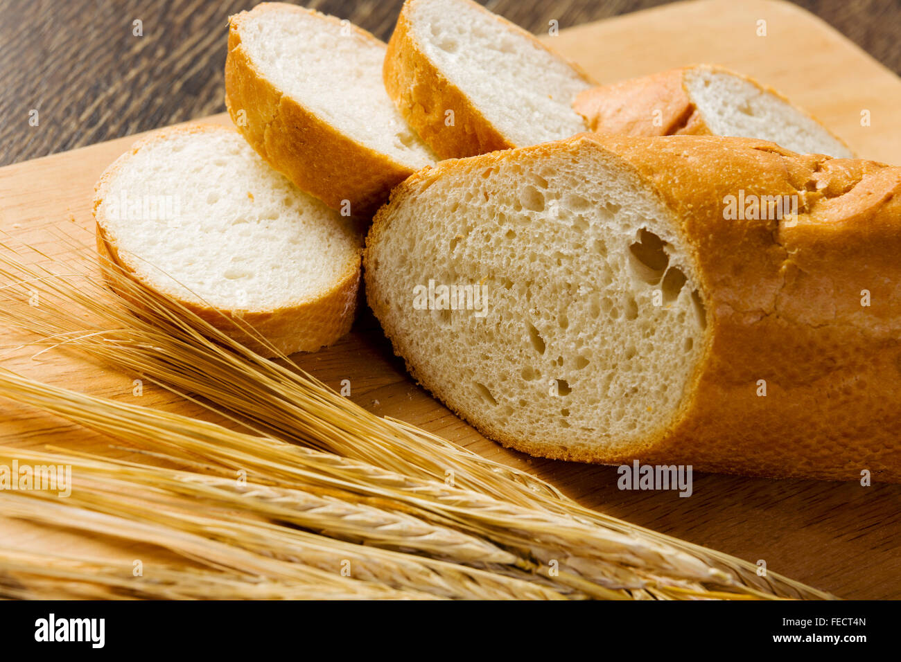 Fresh white sliced bread lying on table Stock Photo - Alamy