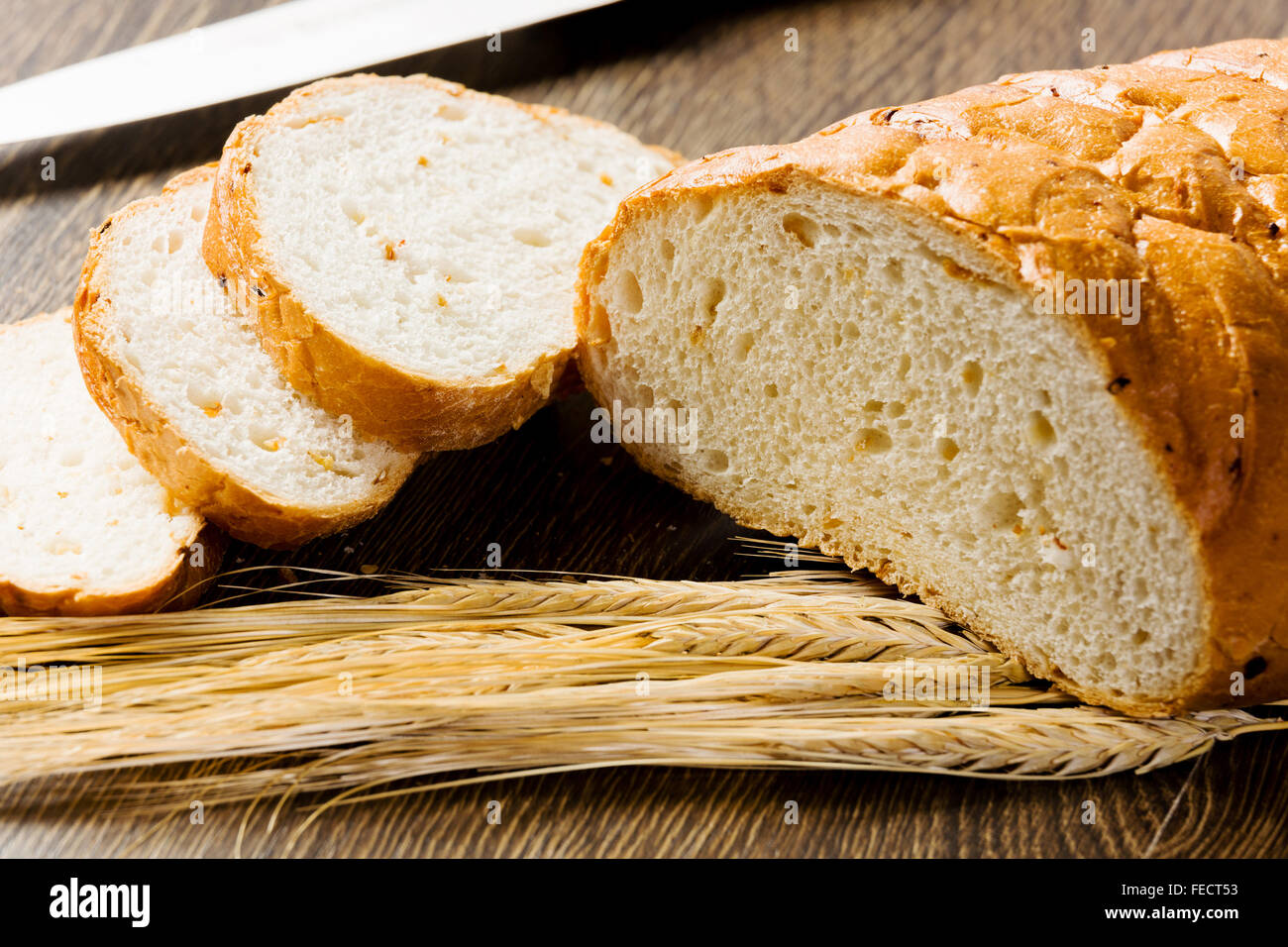 Fresh white sliced bread lying on table Stock Photo - Alamy