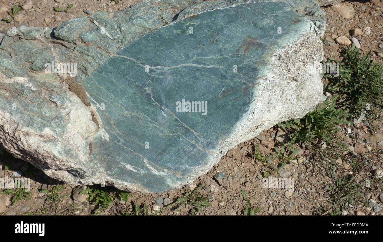 Jade, the raw material before it has been cut and polished Stock Photo