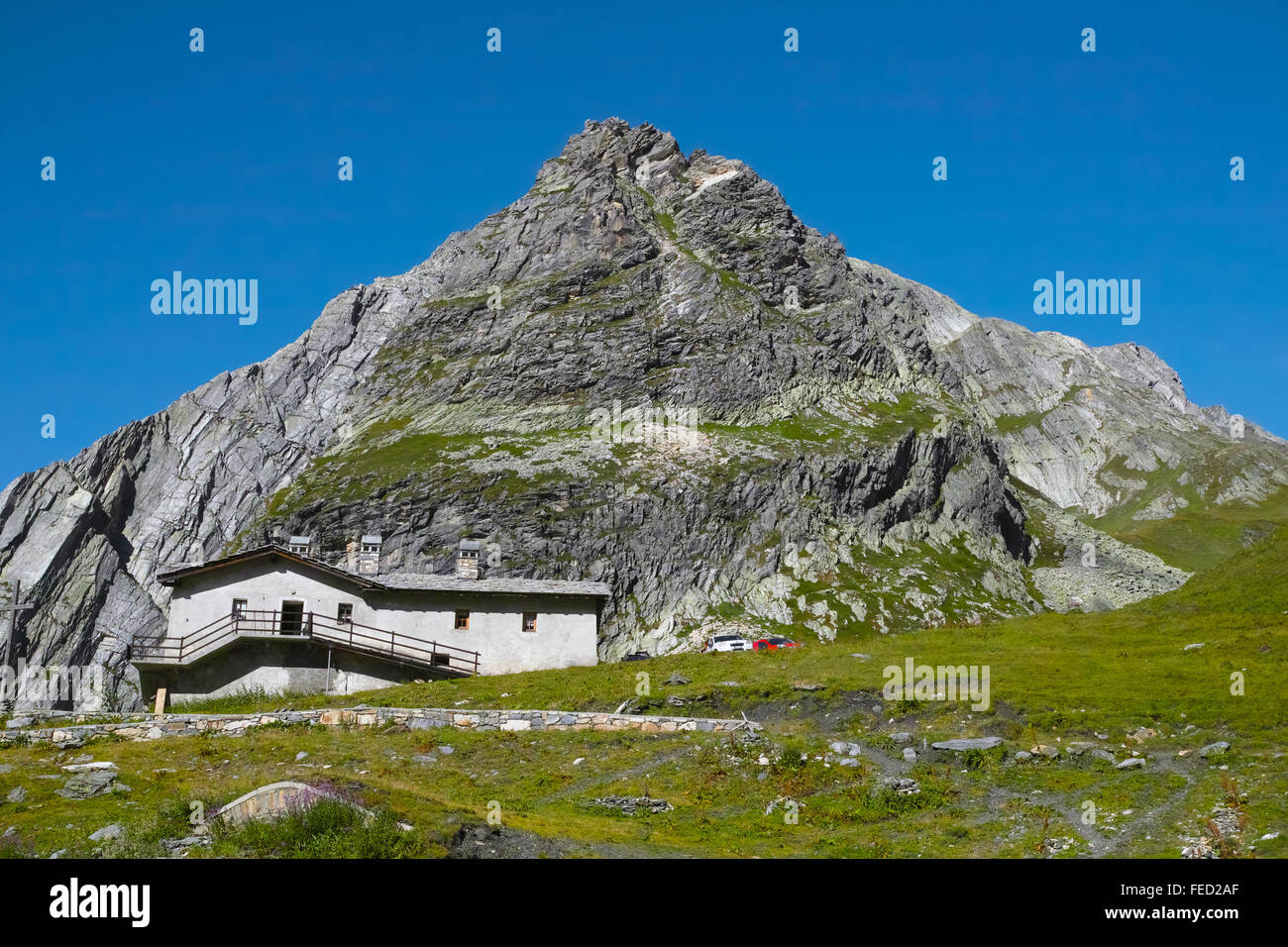 Rock Formation and border control office, San Bernardino Pass, Switzerland. Stock Photo
