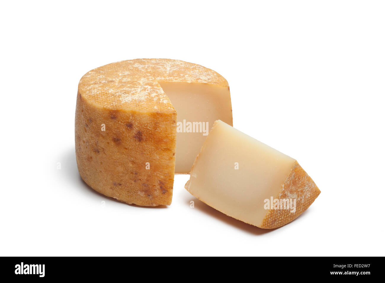 Traditional Basque sheep's milk cheese on white background Stock Photo