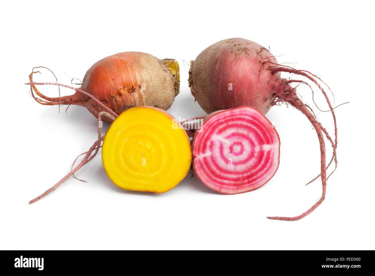 Fresh raw Chioggia beets and yellow beets on white background Stock Photo