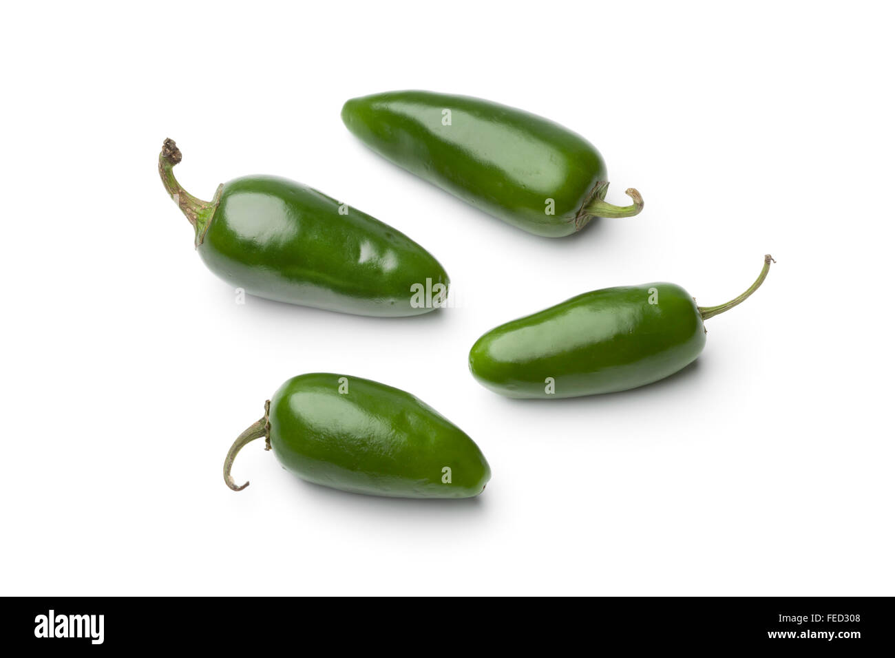 Fresh green Jalapeno chili peppers on white background Stock Photo